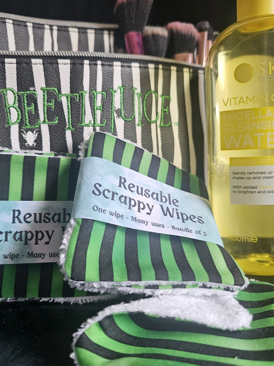 Reusable scrappy wipes with a Beetlejuice-themed pouch and a bottle of micellar water.