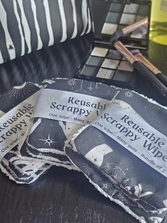 Reusable Scrappy Wipes in their packaging with a makeup palette in the background
