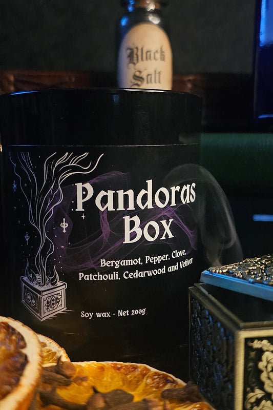 Pandora's Box candle with a dark background