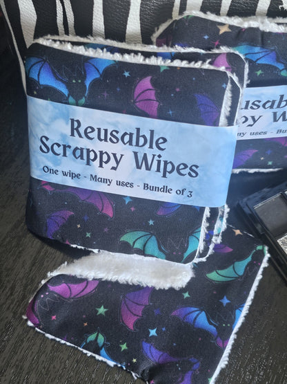 Reusable scrappy wipes with a label on a dark surface