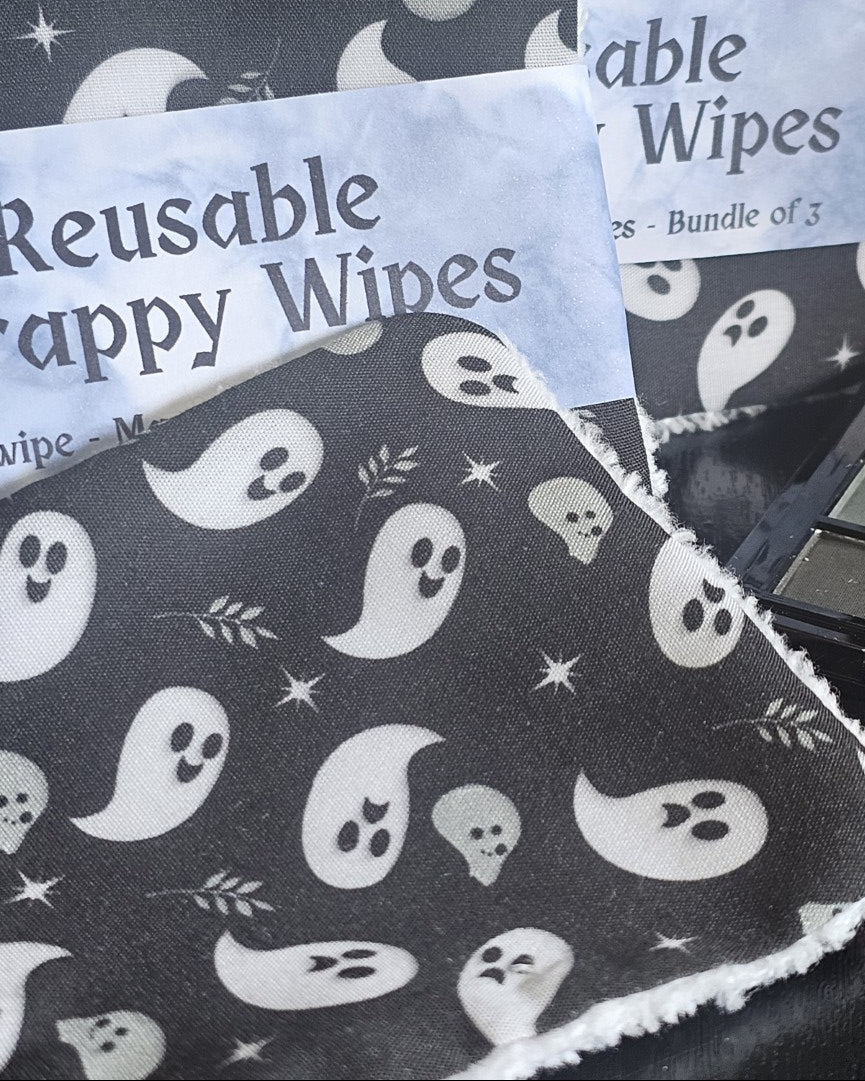 Reusable wipes with ghost pattern on a striped background