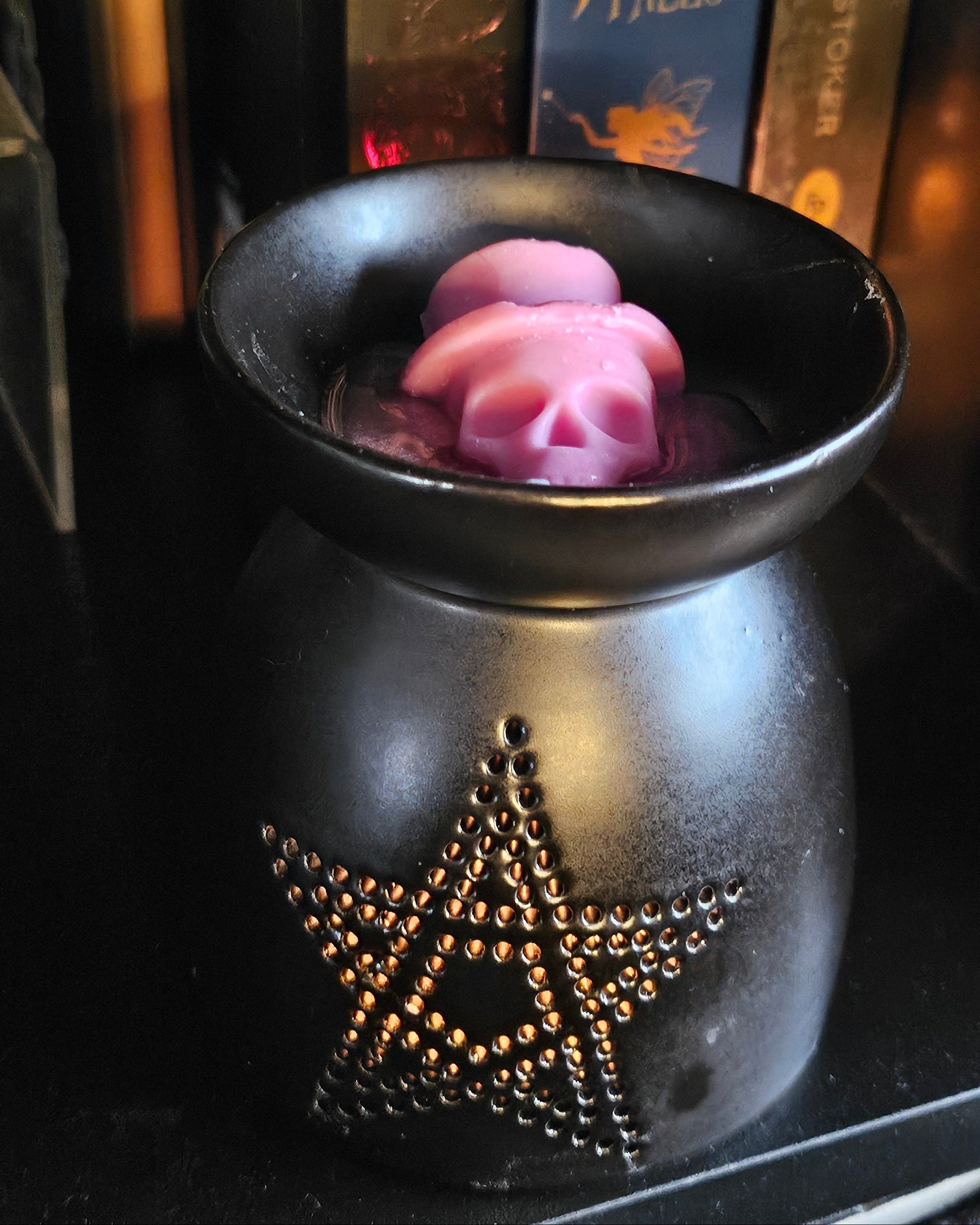 Black ceramic burner with decorative star / pentagram design 