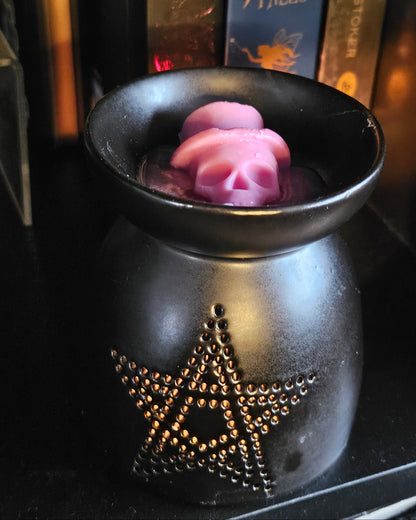 Black ceramic burner with decorative star / pentagram design 